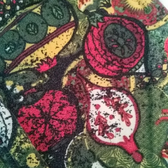 Christmas-themed lularoe leggings. - Picture 2 of 3
